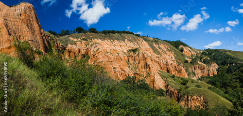 Panorama of Rapa Rosie - Red Ravine in summer under clear blues sky, Alba county, Romania