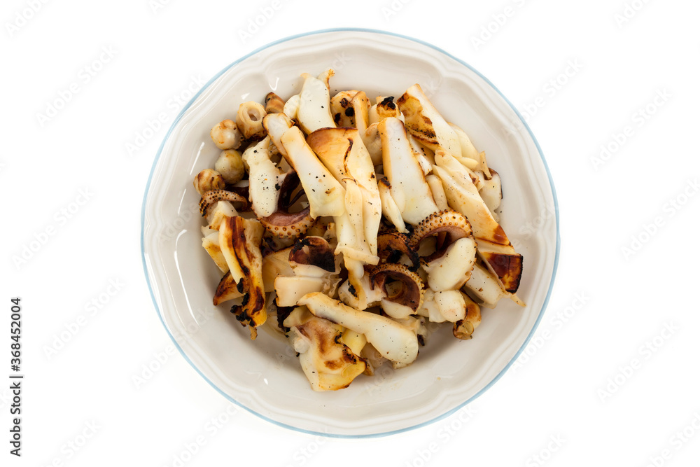 Grilled squid in white plate on a white background Grilled squid in white plate on a white background