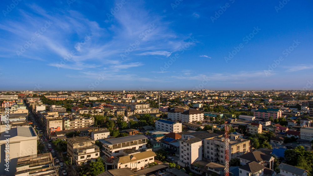 The weight of the evening light in Bangkok city, Thailand by the aerial view.
