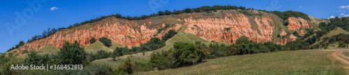 Panorama of Rapa Rosie - Red Ravine in summer under clear blues sky, Alba county, Romania