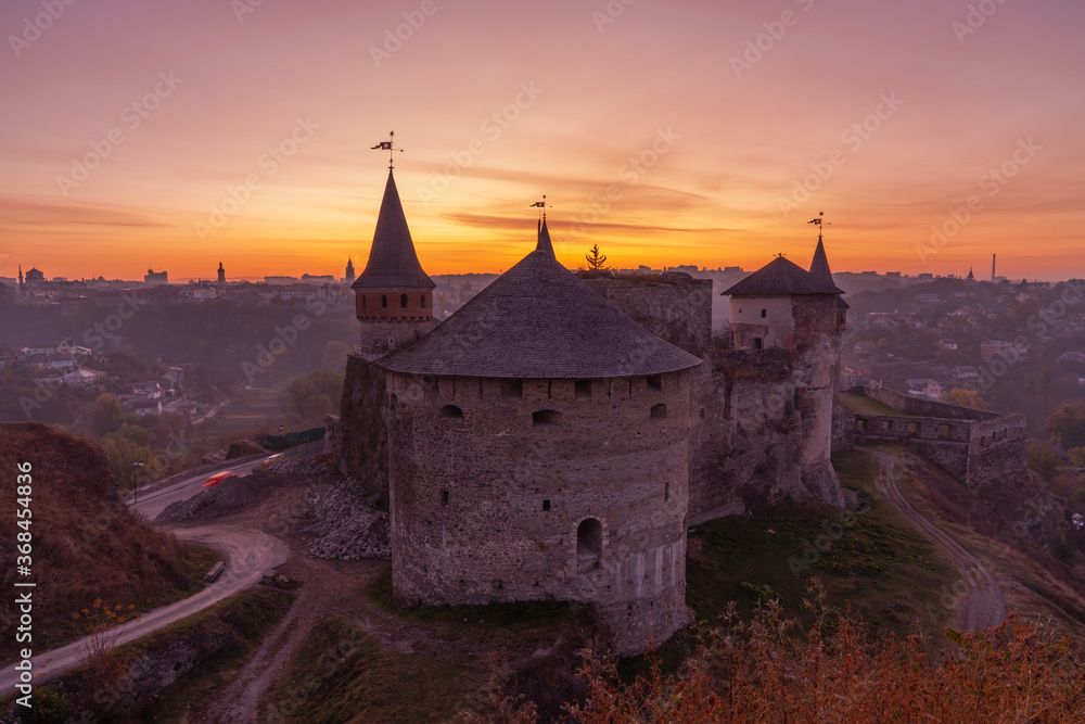 medieval castle or stronghold silhouette and beautiful sunset