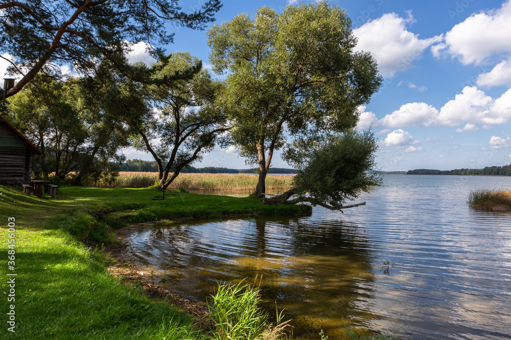 Sunny summer day by lake. taken by Lithuania