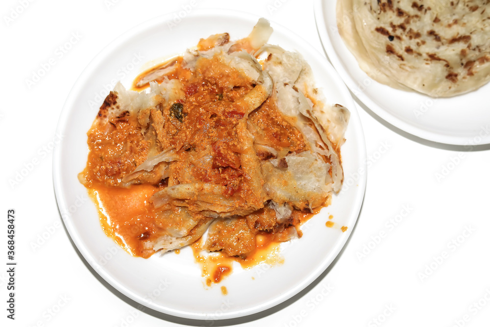 Parotta with Chicken kurma, paratha kurma is a delicacy from the state of Kerala, tamilnadu south India. kurma is mixed veg south Indian curry
