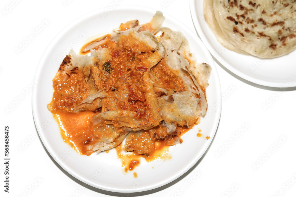 Parotta with Chicken kurma, paratha kurma is a delicacy from the state of Kerala, tamilnadu south India. kurma is mixed veg south Indian curry Parotta with Chicken kurma, paratha kurma is a delicacy from the state of Kerala, tamilnadu south India. kurma is mixed veg south Indian curry