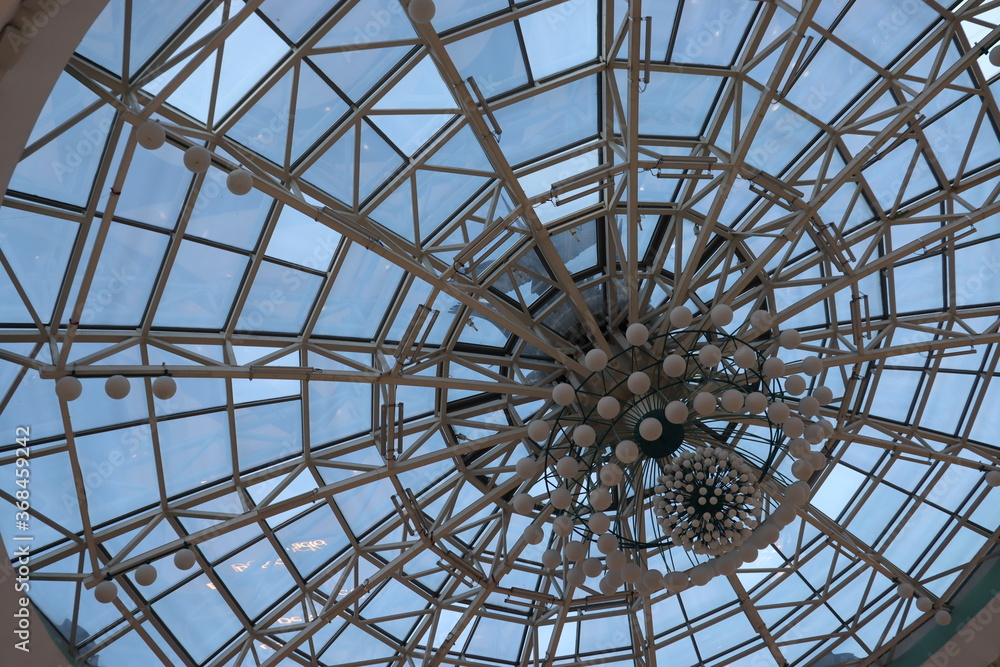 huge lustra hanging on ceiling in mall huge lustra hanging on ceiling in mall