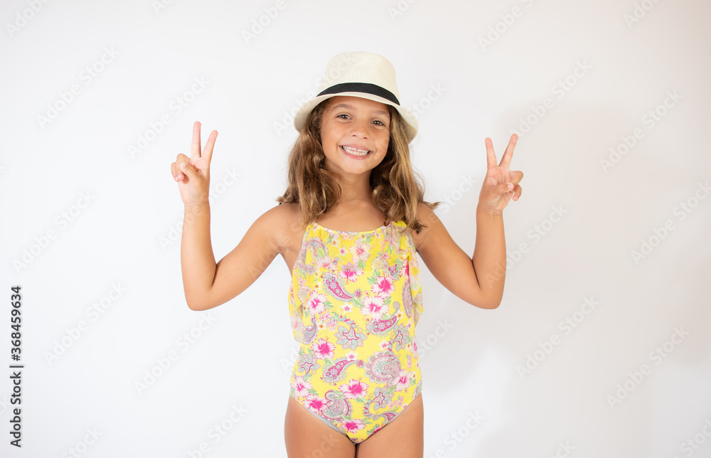 Beautiful girl in colorful swimsuit on white background Beautiful girl in colorful swimsuit on white background