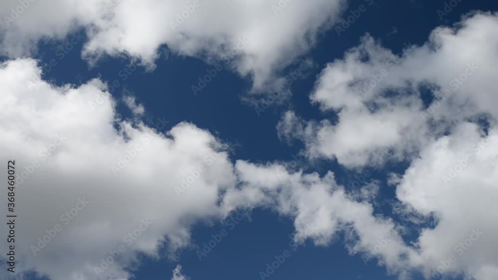 Clouds move quickly and disperse in the daytime sky Clouds move quickly and disperse in the daytime sky