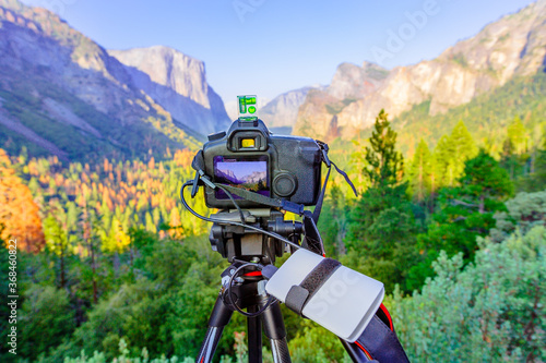 time-lapse of panoramic photography at El Capitan and Half Dome at sunset: El Capitan, Half Dome and Bridalveil Fall from the iconic Tunnel View. American Holidays on the road. photo