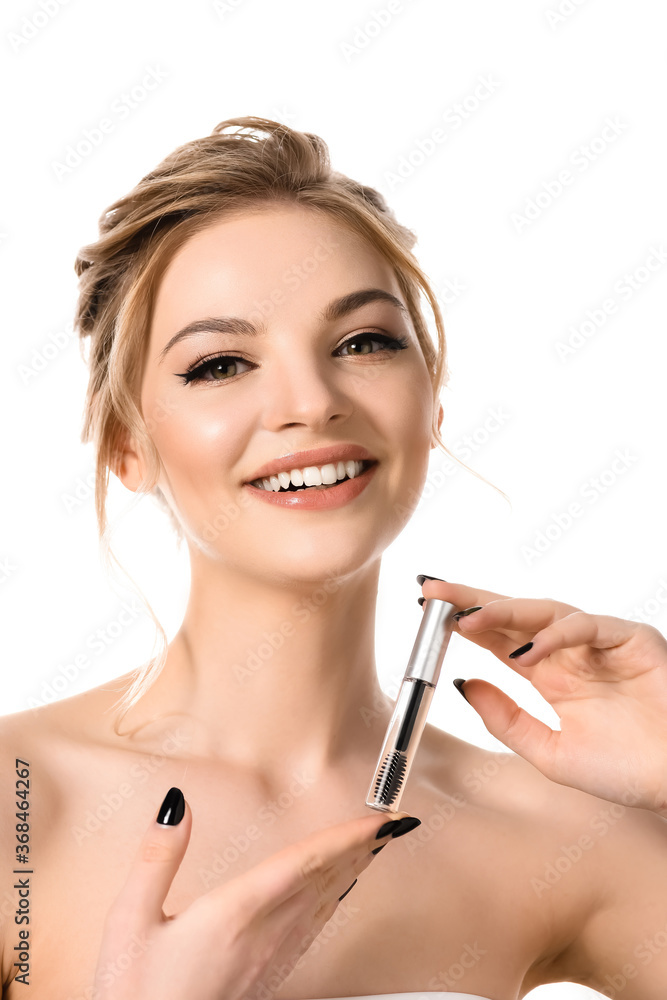 Fototapeta premium smiling naked beautiful blonde woman holding clear brow gel isolated on white
