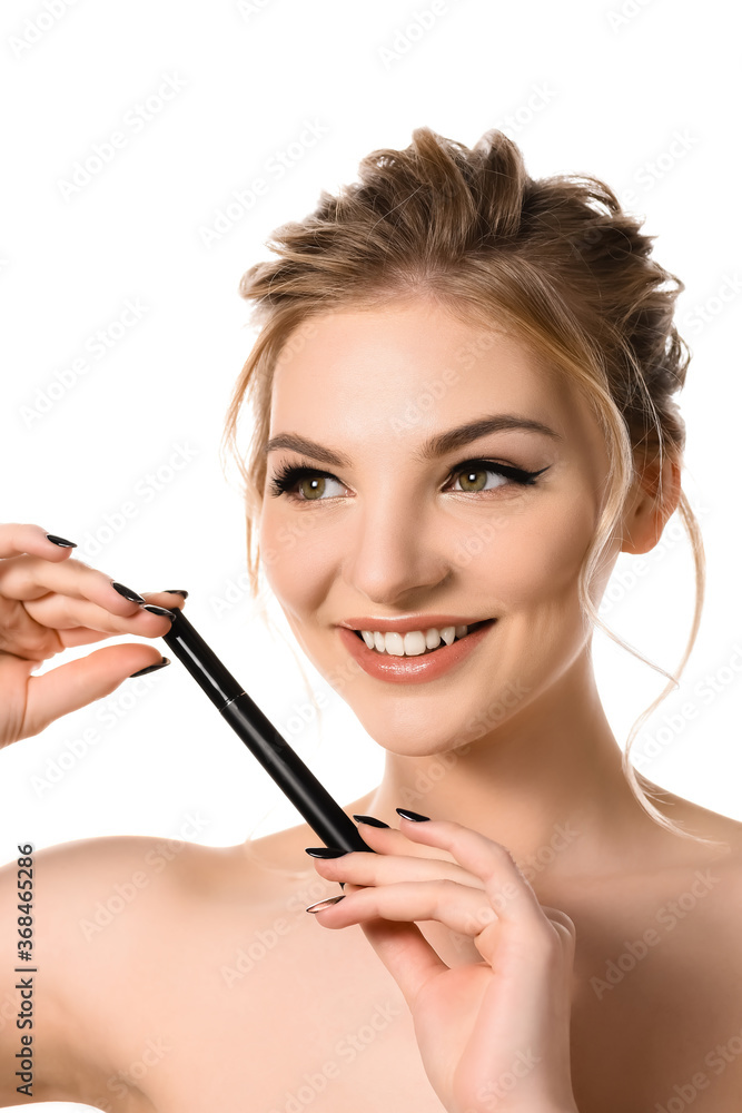 smiling naked beautiful blonde woman with makeup and black nails holding mascara isolated on white smiling naked beautiful blonde woman with makeup and black nails holding mascara isolated on white