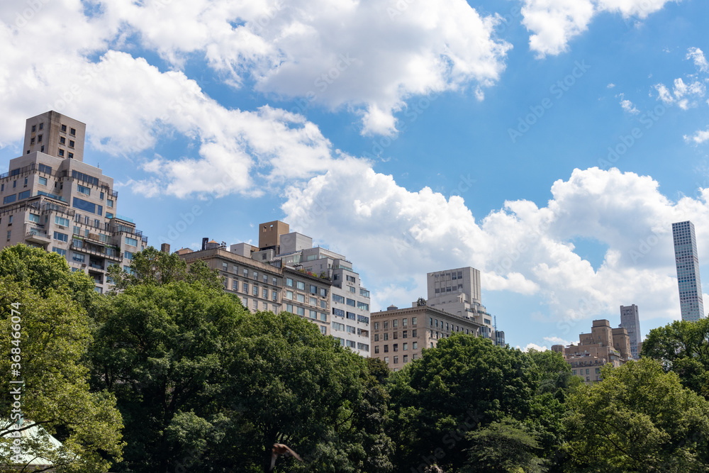 Upper East Side Skyscrapers surrounding Central Park in New York City during Summer