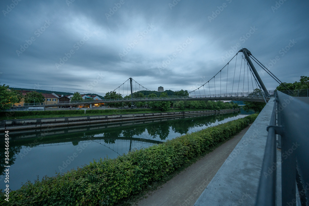 River with bridge at night