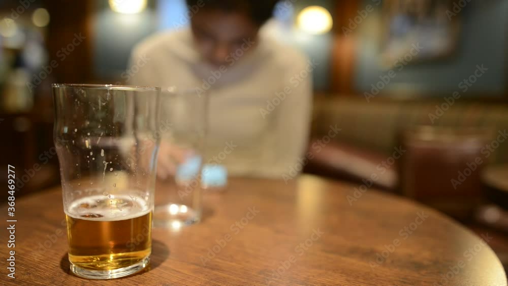 Portrait of young beautiful Asian tourist woman relaxing at the pub indoors Portrait of young beautiful Asian tourist woman relaxing at the pub indoors