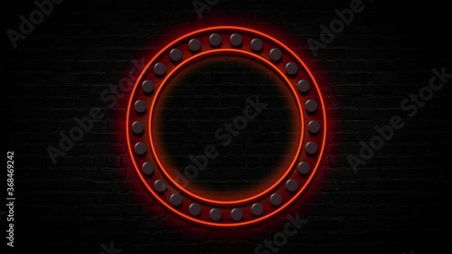 Circle frame with orange lamps on black bricks background, copy space, loop animation