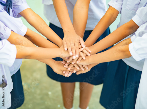 Hands together to show cooperation