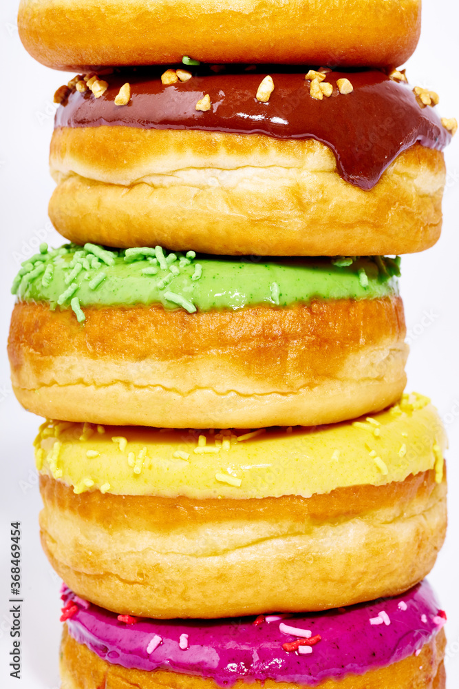A pile of glazed donuts A pile of glazed donuts