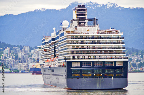 HAL cruiseship or cruise ship liner arrival into Vancouver from Alaska cruising. Kreuzfahrtschiff von Holland America Line geht auf Alaska-Kreuzfahrt von Vancouver, Kanada photo