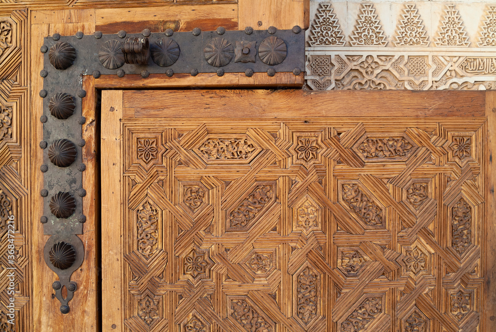 carved door in Islamic Moorish Style in Alhambra, Granada, Spain