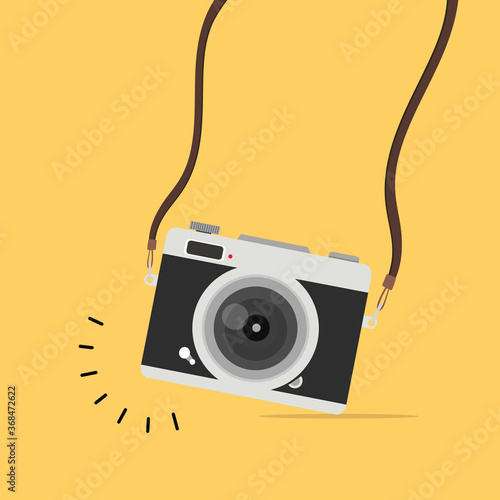 Hanging camera on a colored background