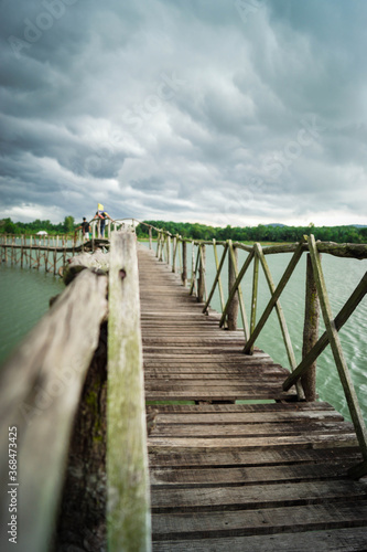 Fototapeta Naklejka Na Ścianę i Meble -  wooden bridge over the river