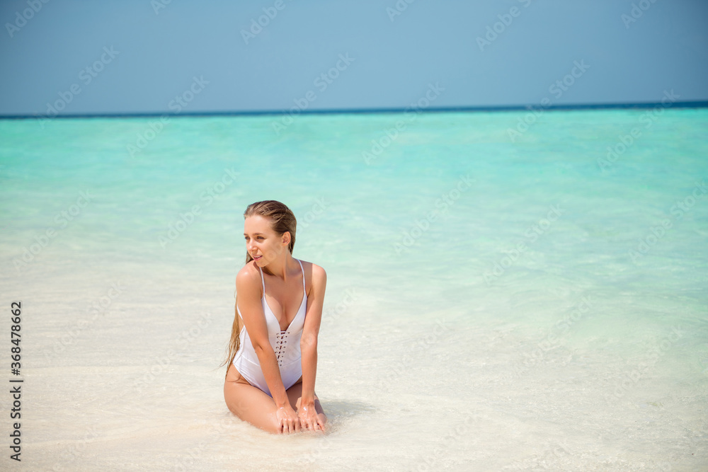 Portrait of her she nice-looking attractive gorgeous slim fit long-haired model spending enjoying sunny day calm peaceful luxury place Bali Goa Hawaii pure clean clear azure aqua plage bay