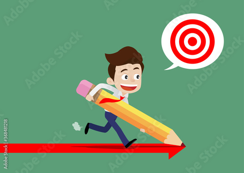 Happy young businessman using a pencil to create a path for himself to achieve his success goal