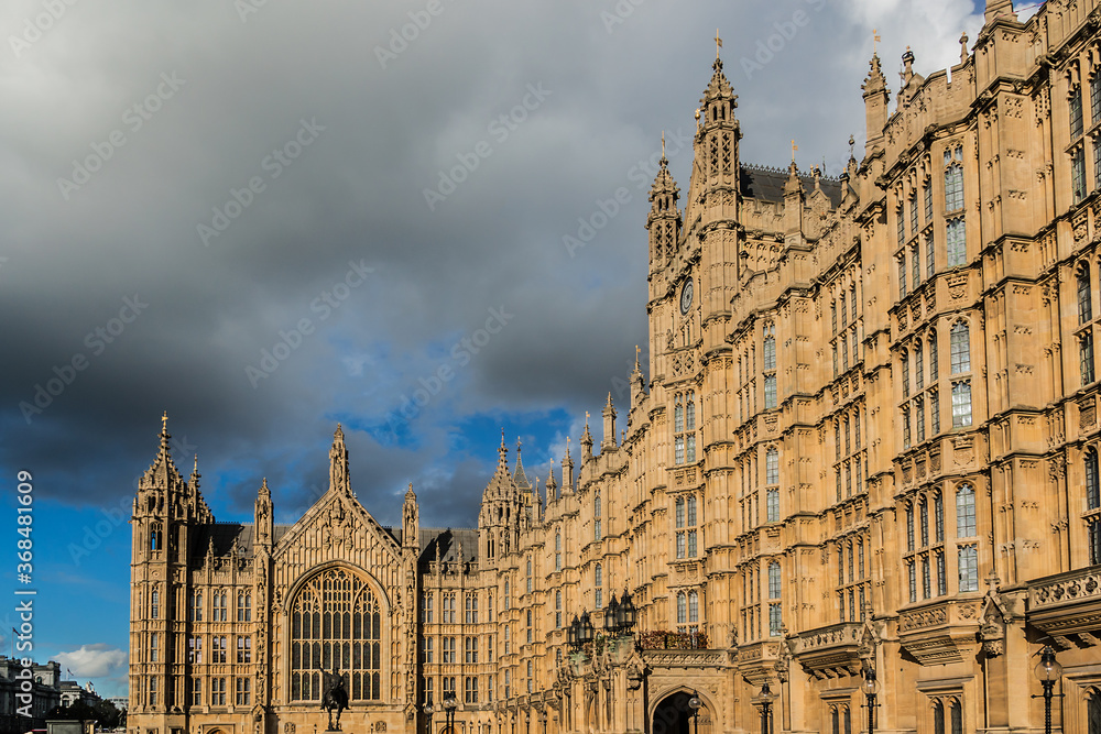 View of architectural details of Palace of Westminster (known as Houses of Parliament) located on north bank of River Thames in City of Westminster. London, England, UK.