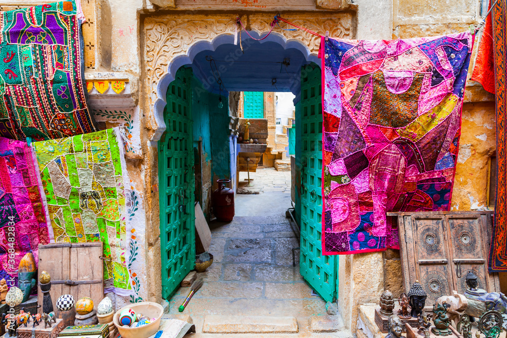 Colors of traditional India. Shop streets in old town Jaisalmer. Rajasthan. Feb 2013 - obrazy, fototapety, plakaty 