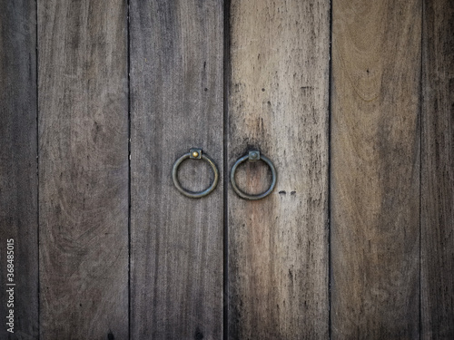 Old vintage retro style wooden door for abstract wood door background and textured.