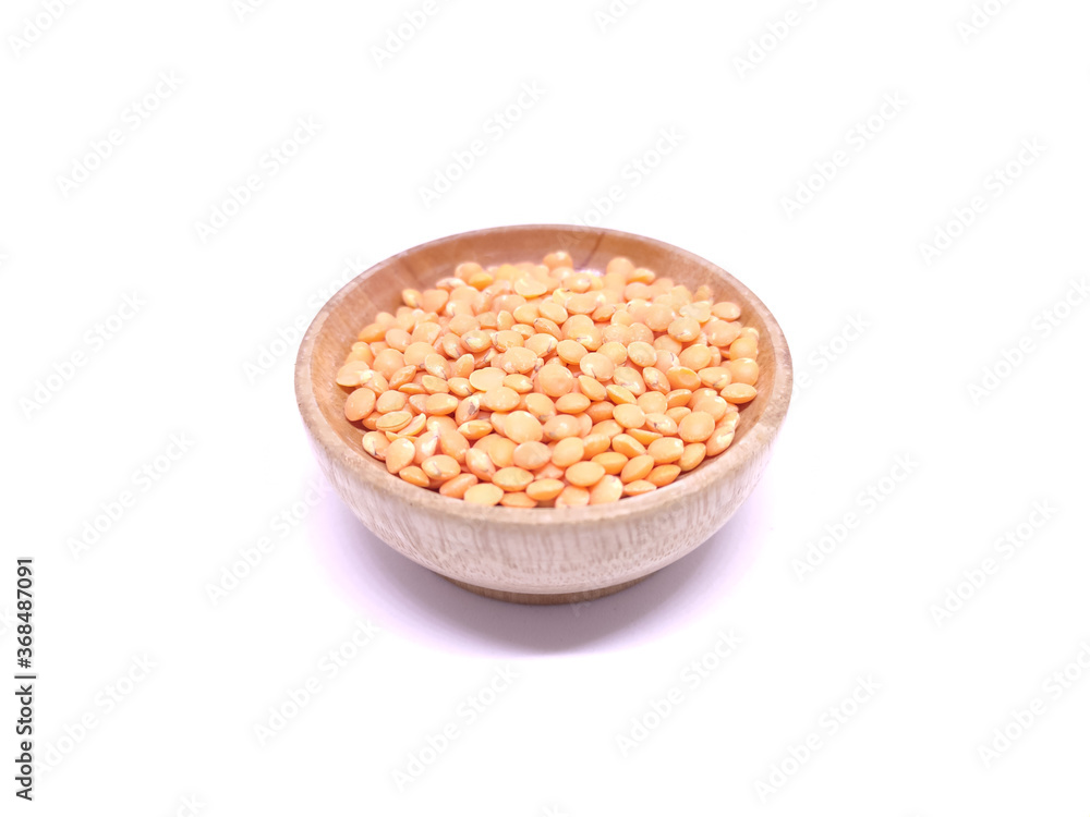 Red Lentils or Masoor Dal in a bowl isolated on White Background. Red lentils rich source of fiber and protein. Healthy food concept. Red Lentils or Masoor Dal in a bowl isolated on White Background. Red lentils rich source of fiber and protein. Healthy food concept.