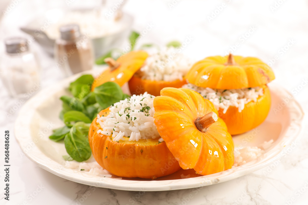 stuffed pumpkin with rice and lettuce