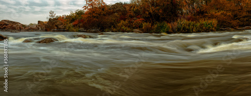 Migea panorama of a mountain river in late autumn photo