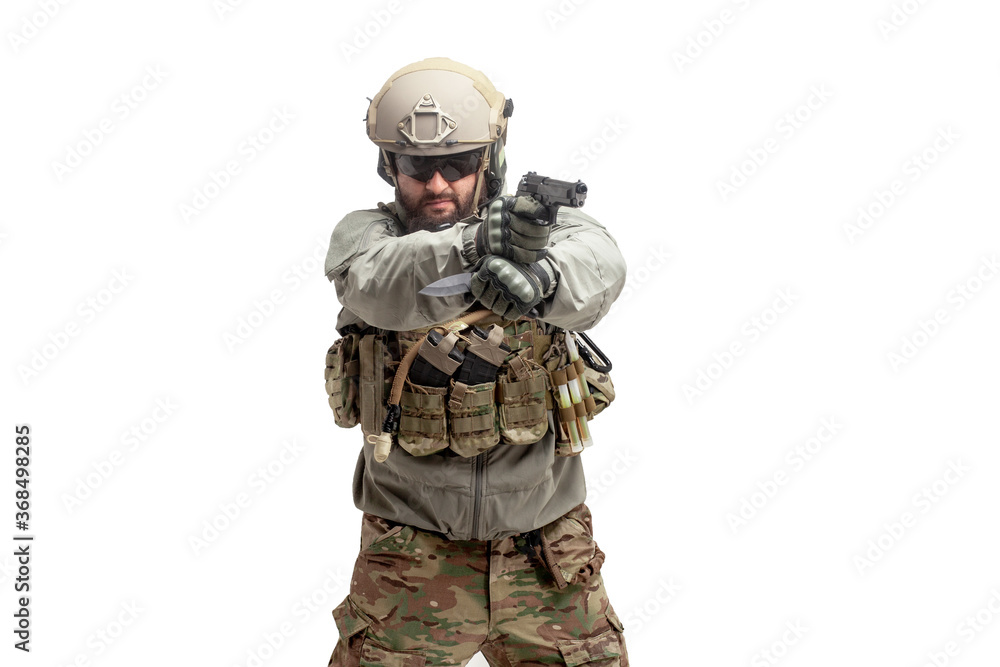 soldier in military equipment with a gun on a white background, a commando in uniform with a gun to aim and attack soldier in military equipment with a gun on a white background, a commando in uniform with a gun to aim and attack