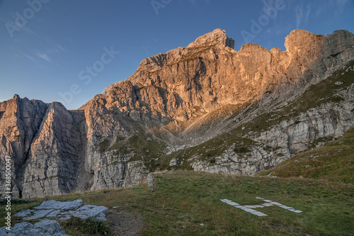 North side of Civetta mountain group as seen from A. Sonino refuge at Coldai, stage eight of Alta Via 1 classic trek in the Dolomites, Zolda Alto municipality, province of Belluno, South Tirol, Italy.