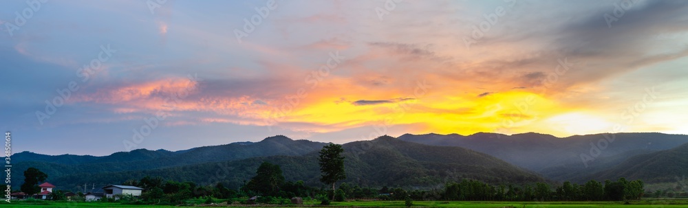 The beautiful panorama landscape,  The Twilight time sunset with colorful clouds at the top of the hill,  Phayao Northern  Thailand