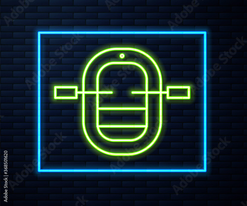 Glowing neon line Rafting boat icon isolated on brick wall background. Inflatable boat with paddles. Water sports, extreme sports, holiday, vacation. Vector Illustration.