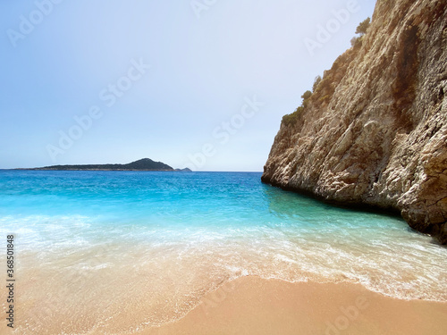 Empty Kaputas Beach with its wave and turquoise water, on a summer day. Kas, Antalya, Turkey