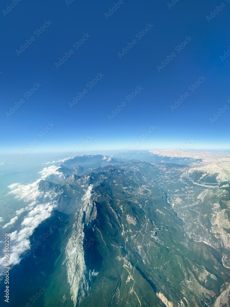 A view from the Antalya Taurus Mountains taken from the plane in the crystal clear day. 