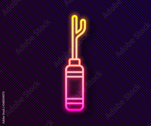 Glowing neon line Awl tool with wooden handle icon isolated on black background. Work equipment tailor industry. Vector Illustration.