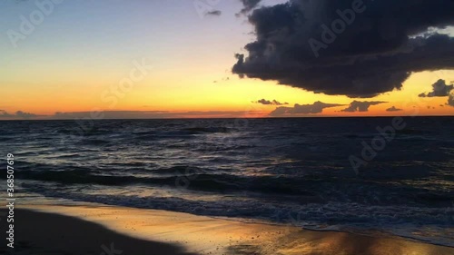 Pobierowo, Poland July 2020 scenic sunset at the baltic sea with dramatic clouds photo