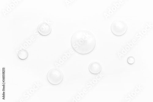 drops of water on a white background  top view