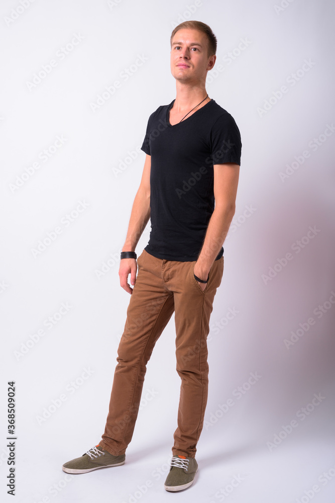 Portrait of handsome man against white background Portrait of handsome man against white background