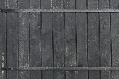 Black and old wooden texture with two iron stripes