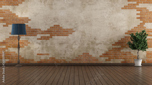Fototapeta Naklejka Na Ścianę i Meble -  Empty old room with brickwall