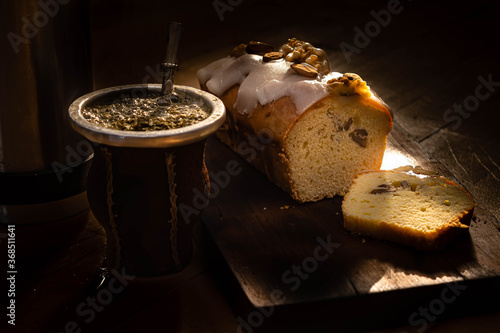 primer plano de budín con frutos secos y mate argentino de yerba y agua  photo