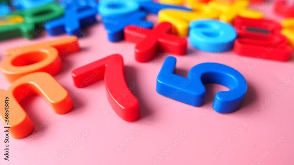 colorful plastic letters on pink background, Close up colorful plastic letters on pink background, Close up