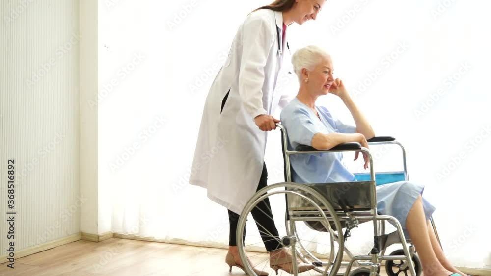 Caucasian medical doctor diagnosed the elderly patient on bed from virus pandemic infection with health care hospital Caucasian medical doctor diagnosed the elderly patient on bed from virus pandemic infection with health care hospital