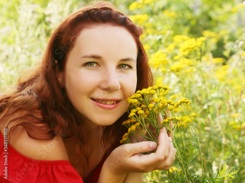 young woman and wild flowers.