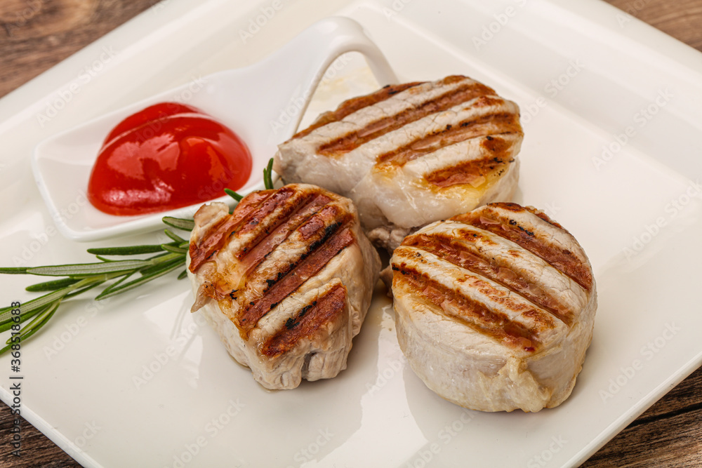 Grilled pork medallion with sauce Grilled pork medallion with sauce