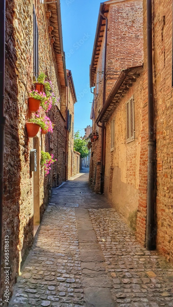 View between the ancient buildings of Città della Pieve, Italy.